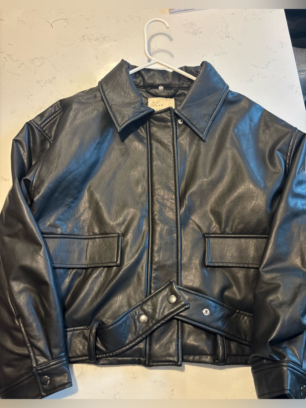 a new day brand new black leather jacket